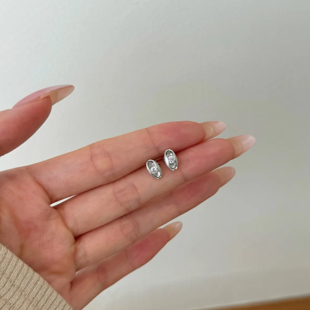 KAKODIY Unique Design 925 Sterling Silver Matte No Fading Oval Frosted Surface Round 5A Cubic Zirconia Stud Earrings - product image 5